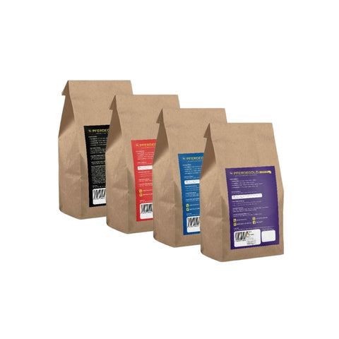 Vier braune Papiertüten von Pferdegold®-Trainingsbundle Nerven, Gelenke, Mineral, Muskeln - mit schwarzen, roten, blauen und violetten Etiketten in einer Reihe, die jeweils den Zusatz von Vitaminen und Mineralstoffen für ein nährendes Erlebnis hervorheben.
